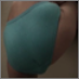 A woman poops in her turquoise colored panties. Over a minute.